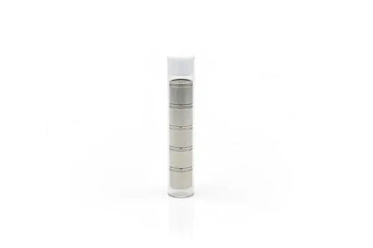 metal dosing capsules in plastic caddy 